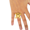 Anillo precolombino jaguar Tolima en aleación con baño en oro 24K, talla ajustable.
