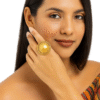 Anillo precolombino Muisca con diseño del sol y baño en oro 24K, talla ajustable.
