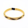 Pulsera de cobre dorado artesanal diseño Marfil elaborada en Colombia